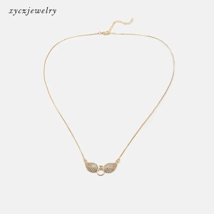 Gold Salty Angel Wings Necklace with intricate wing design, crafted by Drpshippr, perfect for elegant jewelry styling.