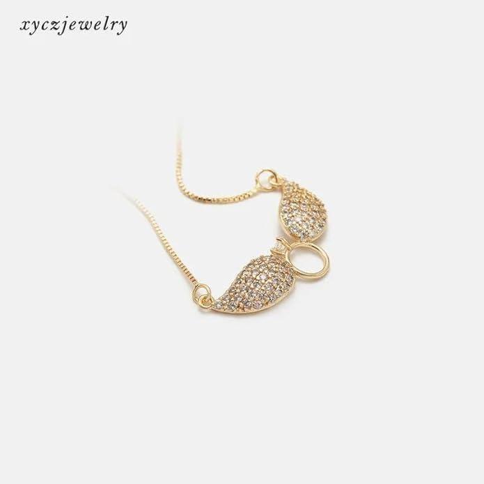 Gold Salty Angel Wings Necklace from Drpshippr showcasing detailed angel wing pendant on a delicate chain.