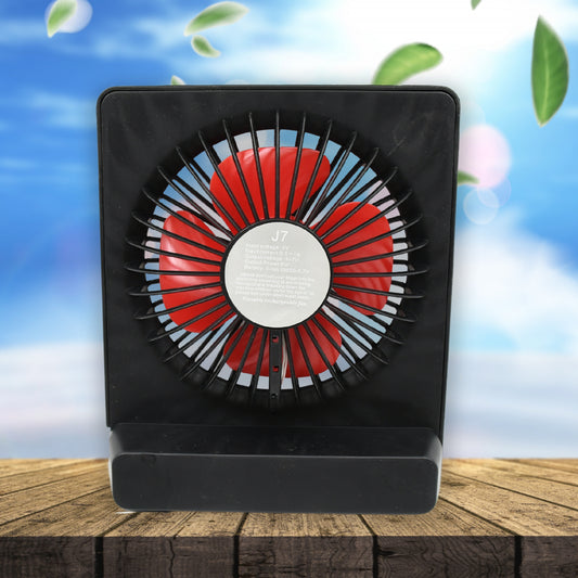Wukusy 8890 portable desk fan with one-speed setting, compact personal table fan for office, school, or home use.