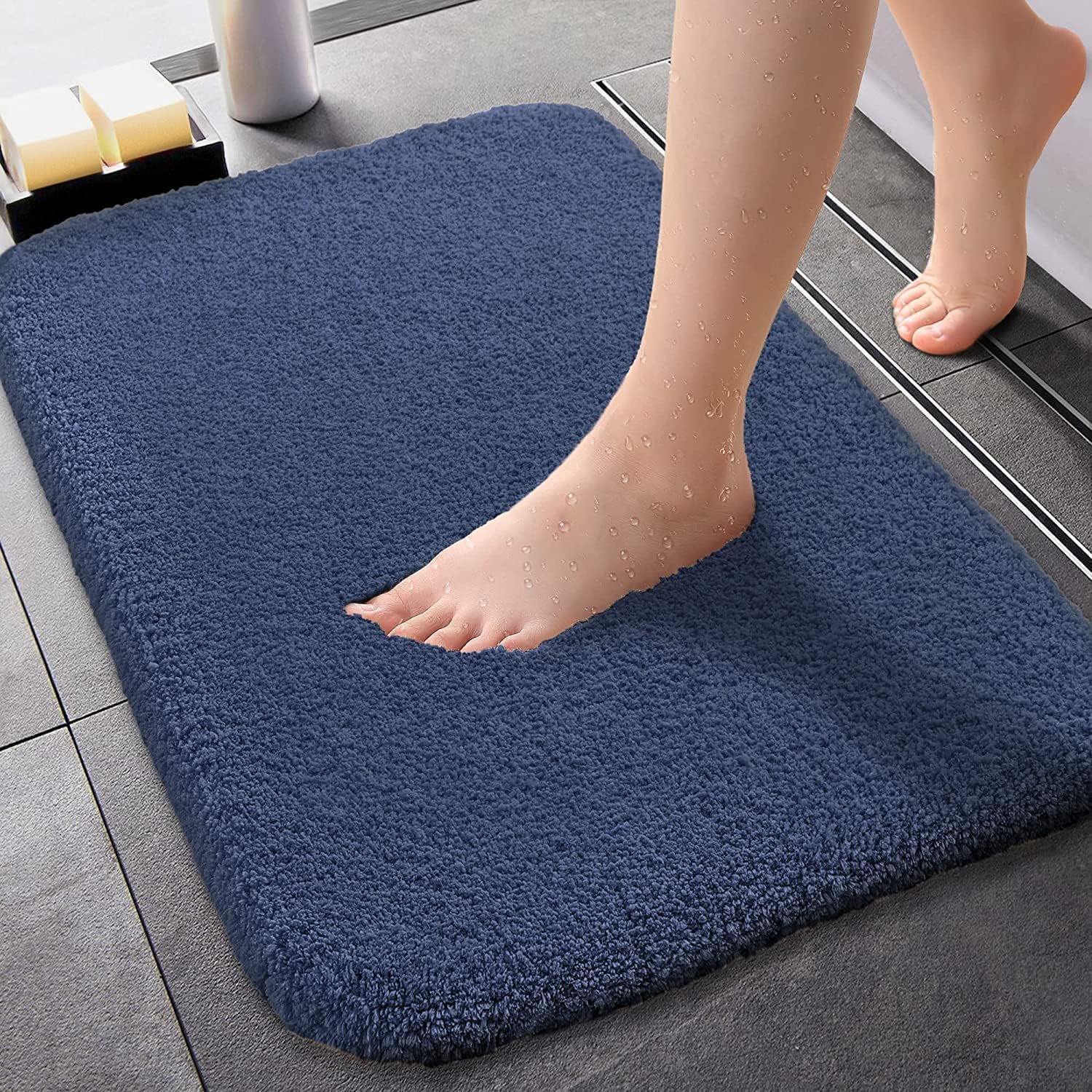Seasons microfiber anti-slip bathmat set in navy blue featuring soft, absorbent material and textured surface for safety.