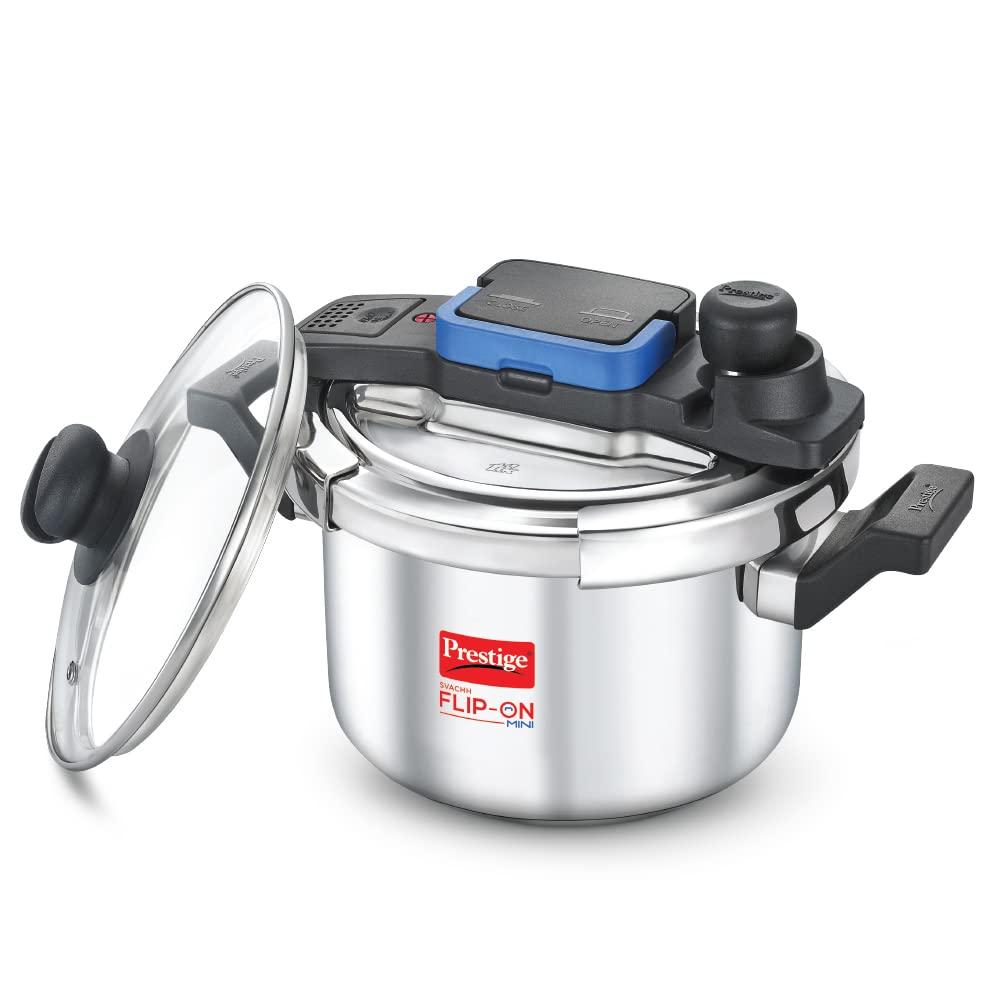Seasons Prestige Svachh Flip-On 5L stainless steel induction bottom pressure cooker on kitchen countertop.
