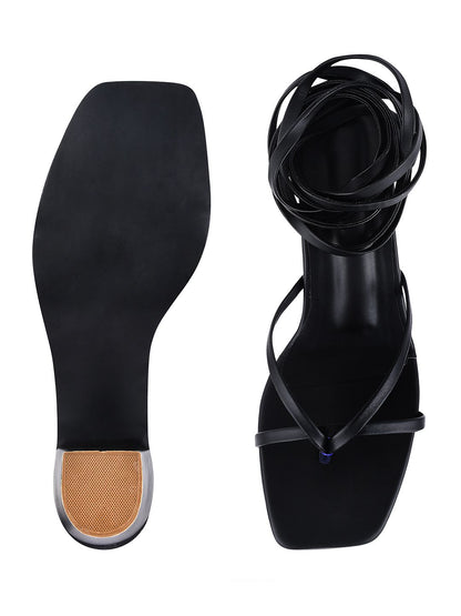 Black women's sandals from Shoetopia's collection featuring stylish open-toe heels by Drpshippr.