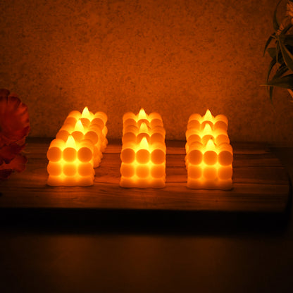 Set of nine decorative LED bubble candles by Wukusy, enhancing home decor with soft glowing, colorful bubble designs.