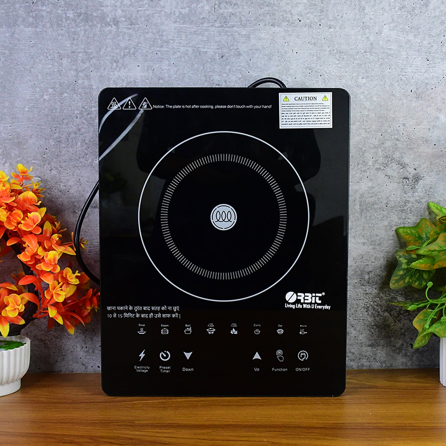 Wukusy Orbit Touch Control Induction Cooker with multiple cooking zones, 2000W power, sleek black surface and digital touch panel.