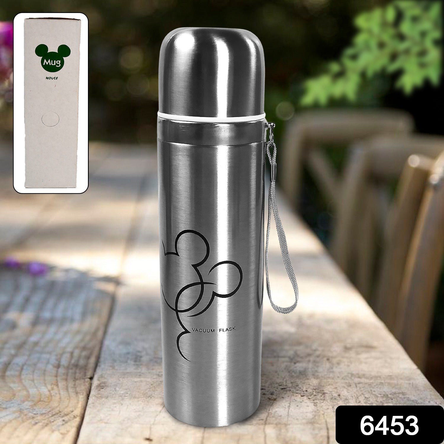 Wukusy 6453 stainless steel vacuum water bottle, 500ml capacity, with sleek silver finish and secure screw-top lid.