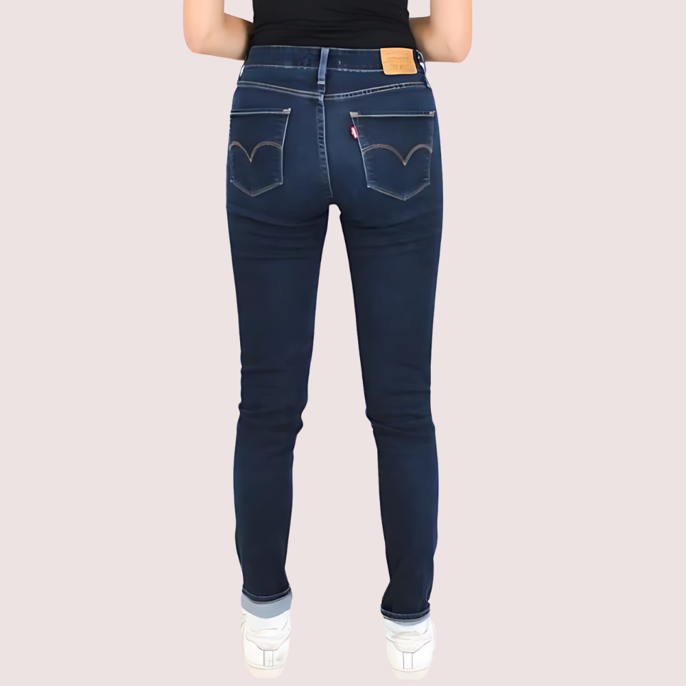 Elegant women's skinny fit slim denim pants by Snazzyway, shown in a close-up of the dark denim fabric and tailored fit.