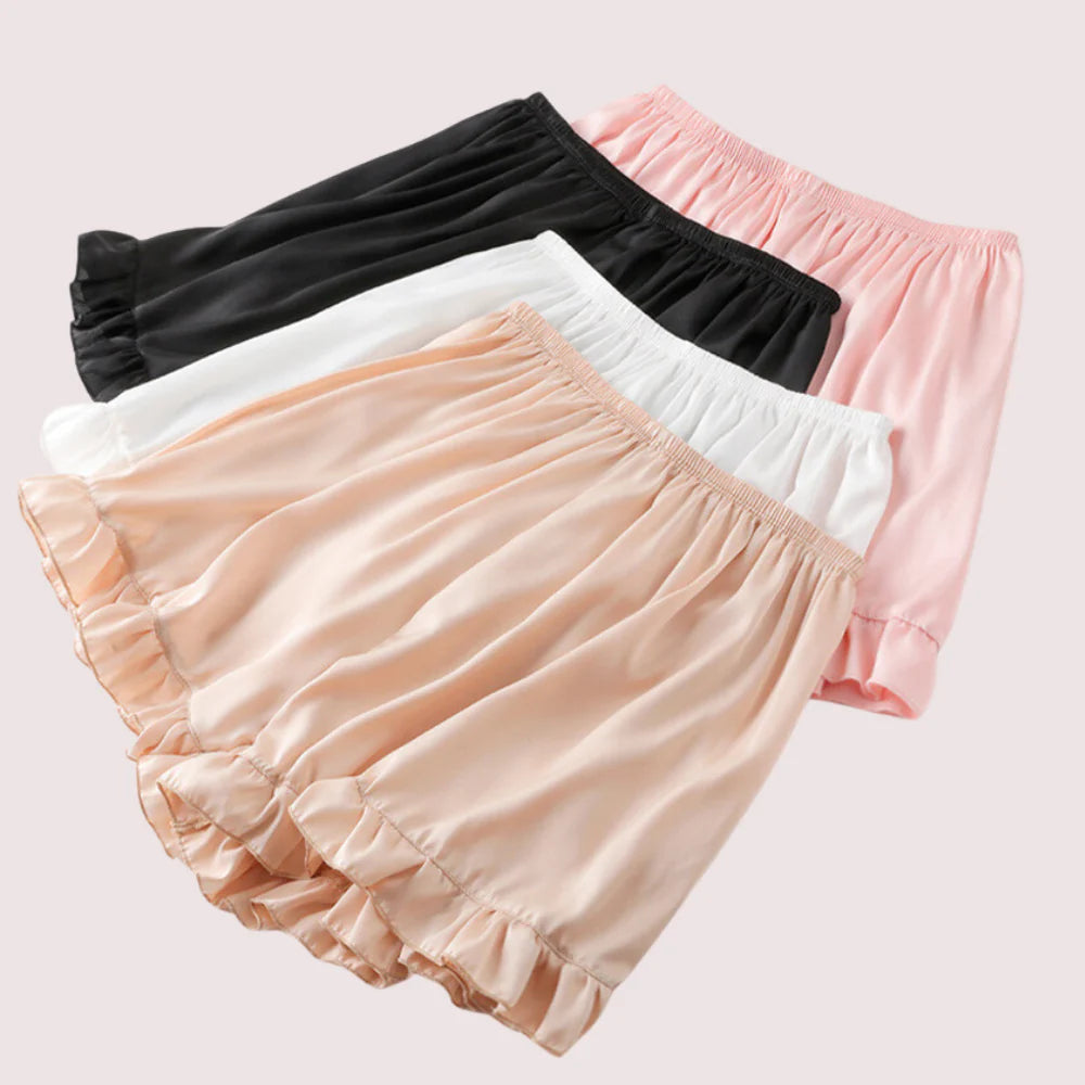 Women’s ruffled satin faux silk French underwear by Snazzyway, featuring delicate ruffles and smooth, shiny fabric.