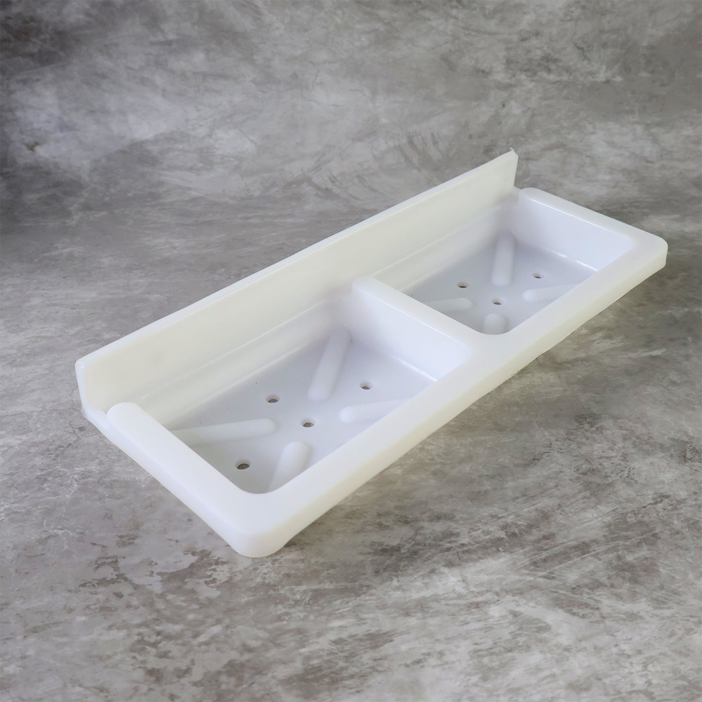 Wukusy wall-mounted double soap and sponge holder in white, designed for organizing bathroom or kitchen countertops.