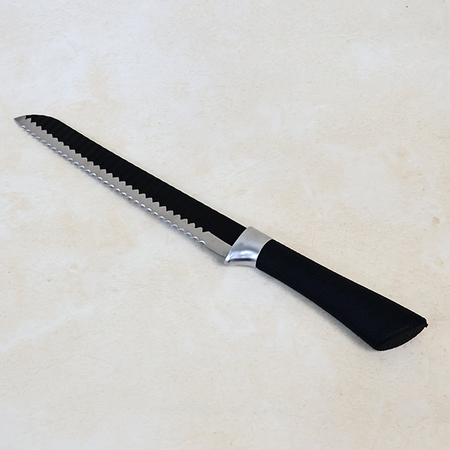 Wukusy 32 cm serrated bread knife with ergonomic handle for easy slicing of bread and bakery items in the kitchen.
