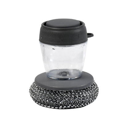 Wukusy soap dispensing palm dish brush with liquid dish soap for cleaning pots, utensils, and cookware in kitchen.