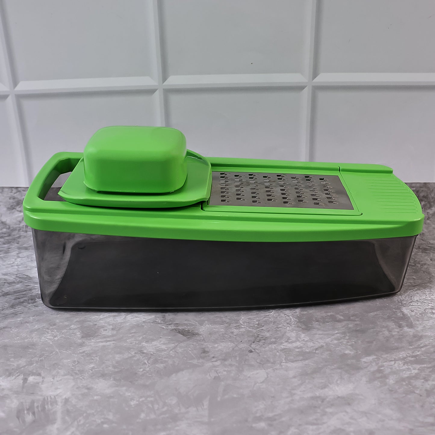 Wukusy Supermom 14-in-1 Nicer Dicer vegetable and fruit chopper with multiple blades for quick slicing and dicing.