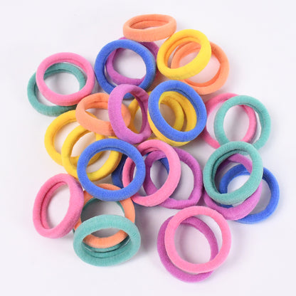 Set of 30 Wukusy mini hair ties and hairbands, small elastic hair accessories for styling and securing hair.