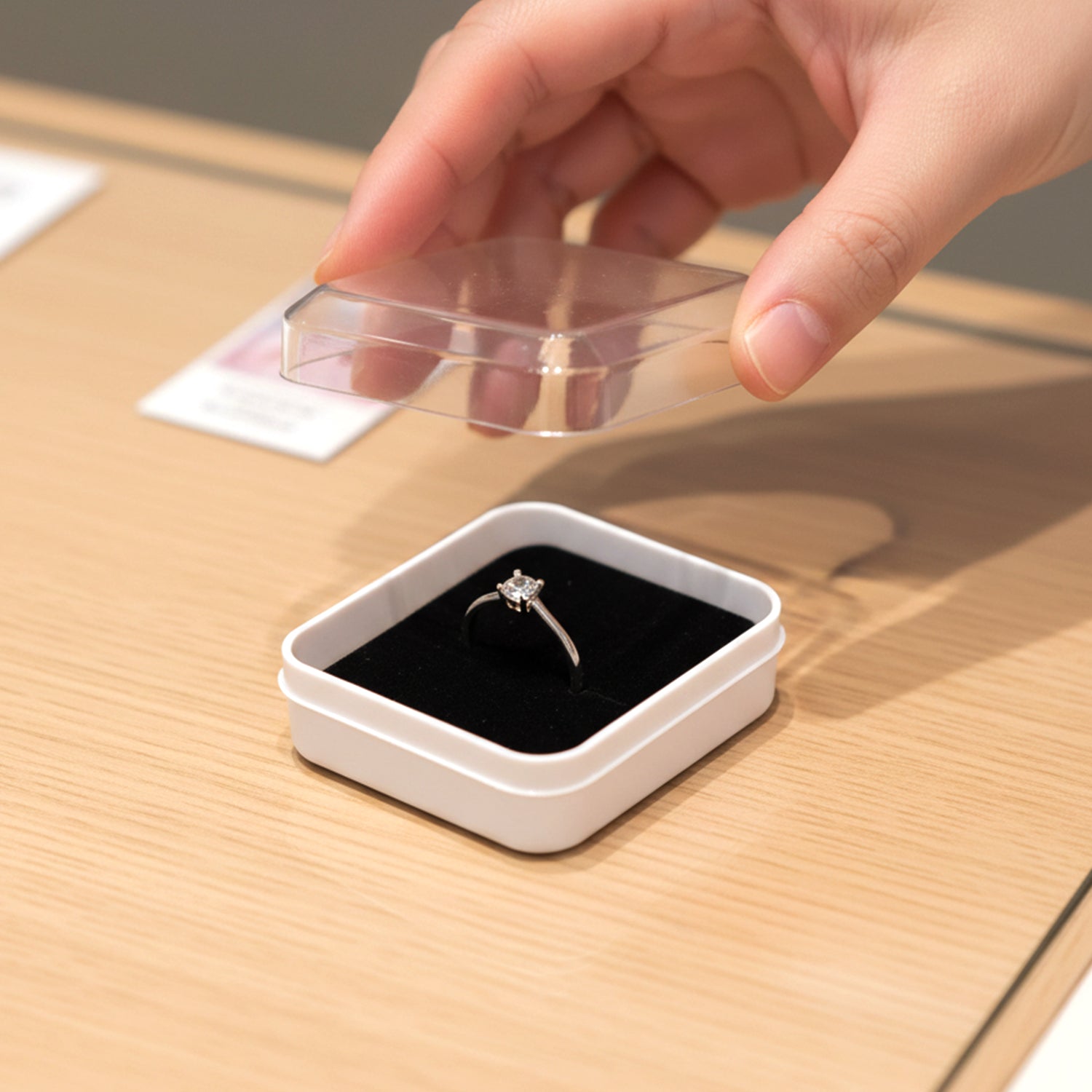 Wukusy mini jewelry storage box for rings and earrings, small accessory organizer with 12 compartments, compact and practical.