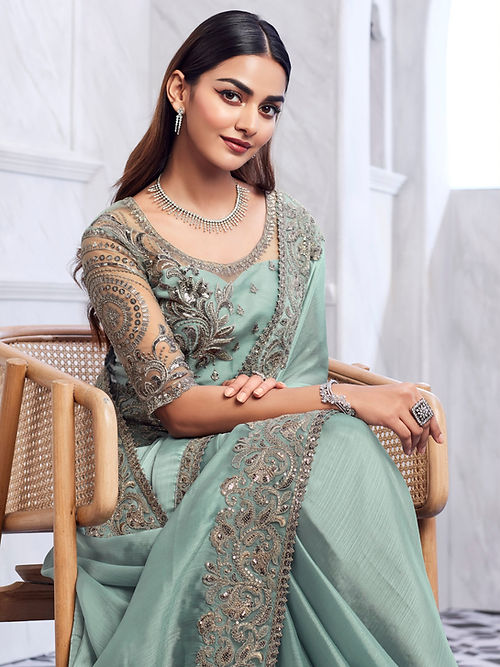 Summer green embroidered silk saree from Drpshippr, featuring intricate embroidery for party wear in a women's collection.