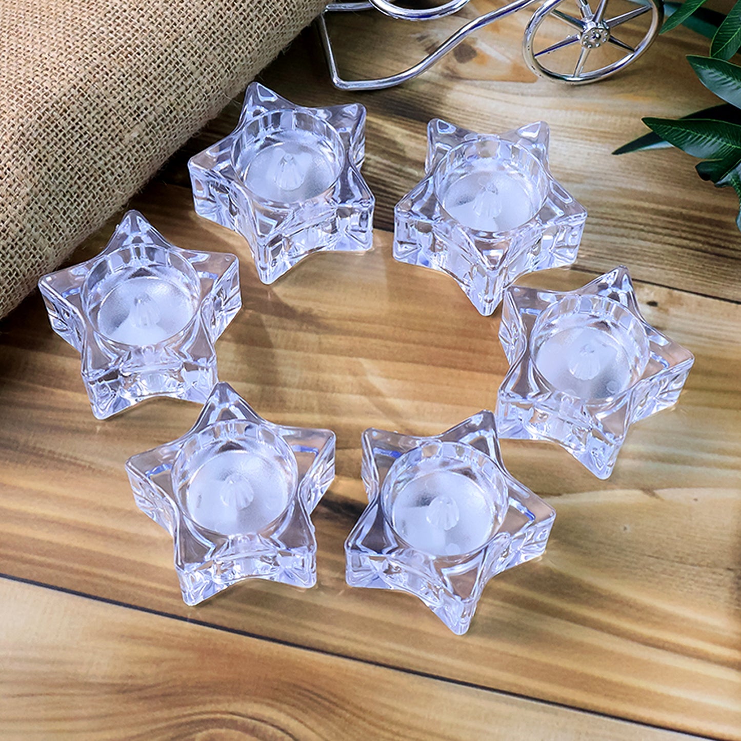 Set of six flameless star-shaped LED candles by Wukusy for home decor, featuring warm glowing lights and realistic flicker.