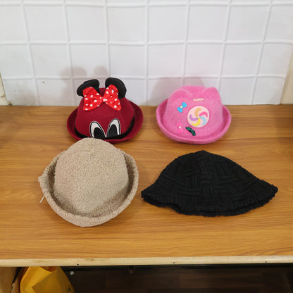 Wukusy bucket style cap for men, women, and kids, featuring a versatile winter and summer design with a wide brim.