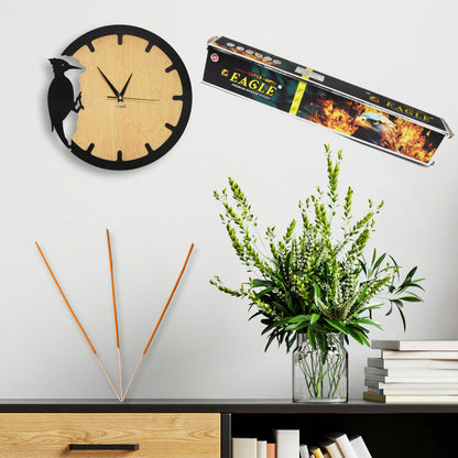 Wukusy Mosquito Agarbatti sticks in a box with 12 packets, each containing 10 incense sticks, designed to repel mosquitoes.