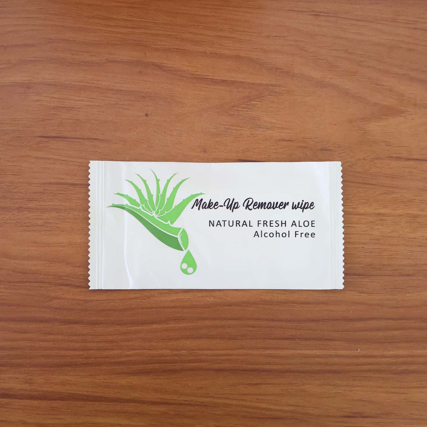 Wukusy natural aloe makeup remover wipe, single soft cloth for gentle facial cleansing and makeup removal.