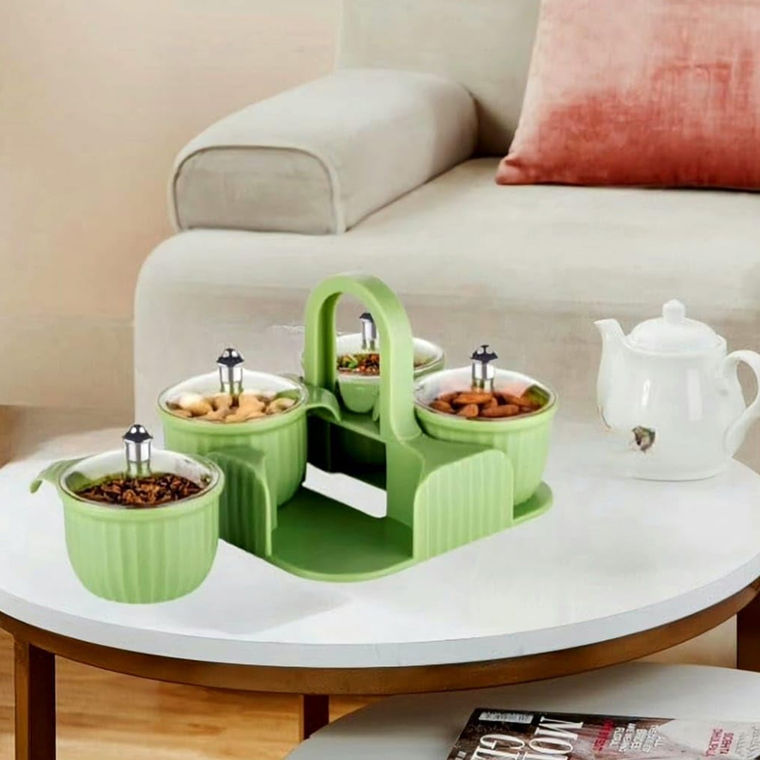 Set of four Wukusy multipurpose plastic jars with lids for dry fruits, candies, chocolates, and snacks in a home kitchen.