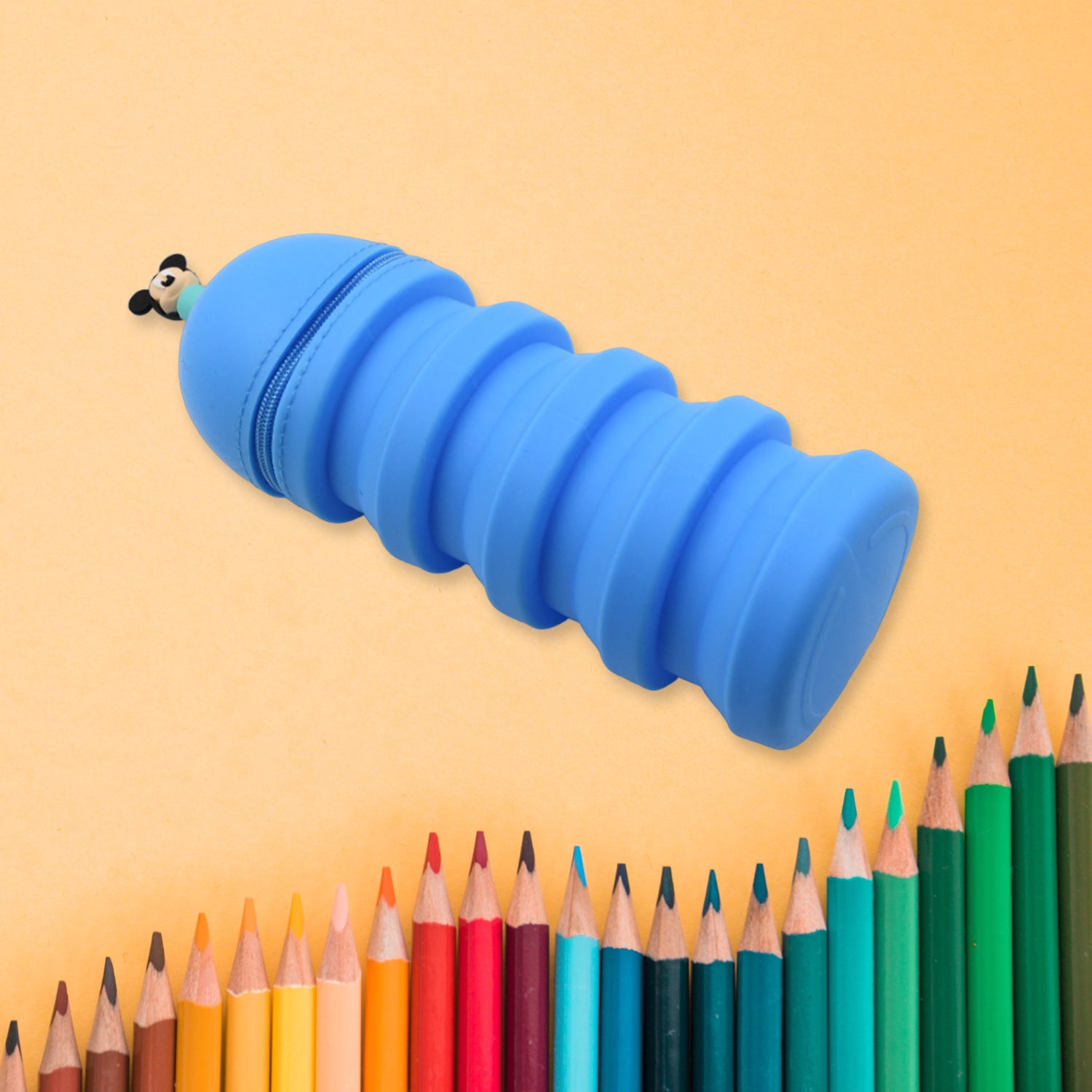 Pink silicone telescopic pencil case with zipper closure, large capacity, suitable for school, home, or office use by boys and girls.
