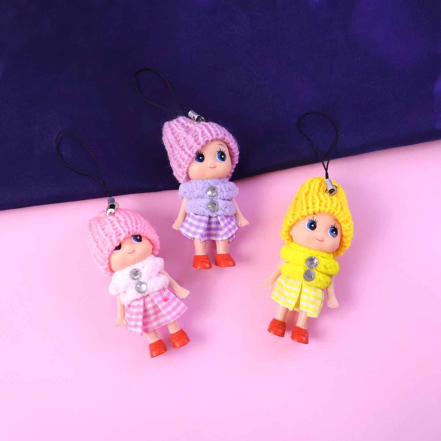 Six colorful Wukusy mini doll hanging keychains in various mixed colors, perfect for accessories or bag decorations.