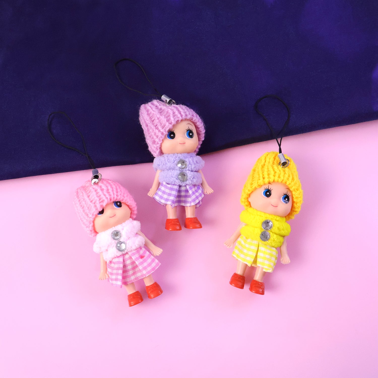 Six colorful Wukusy mini doll hanging keychains in various mixed colors, perfect for accessories or bag decorations.