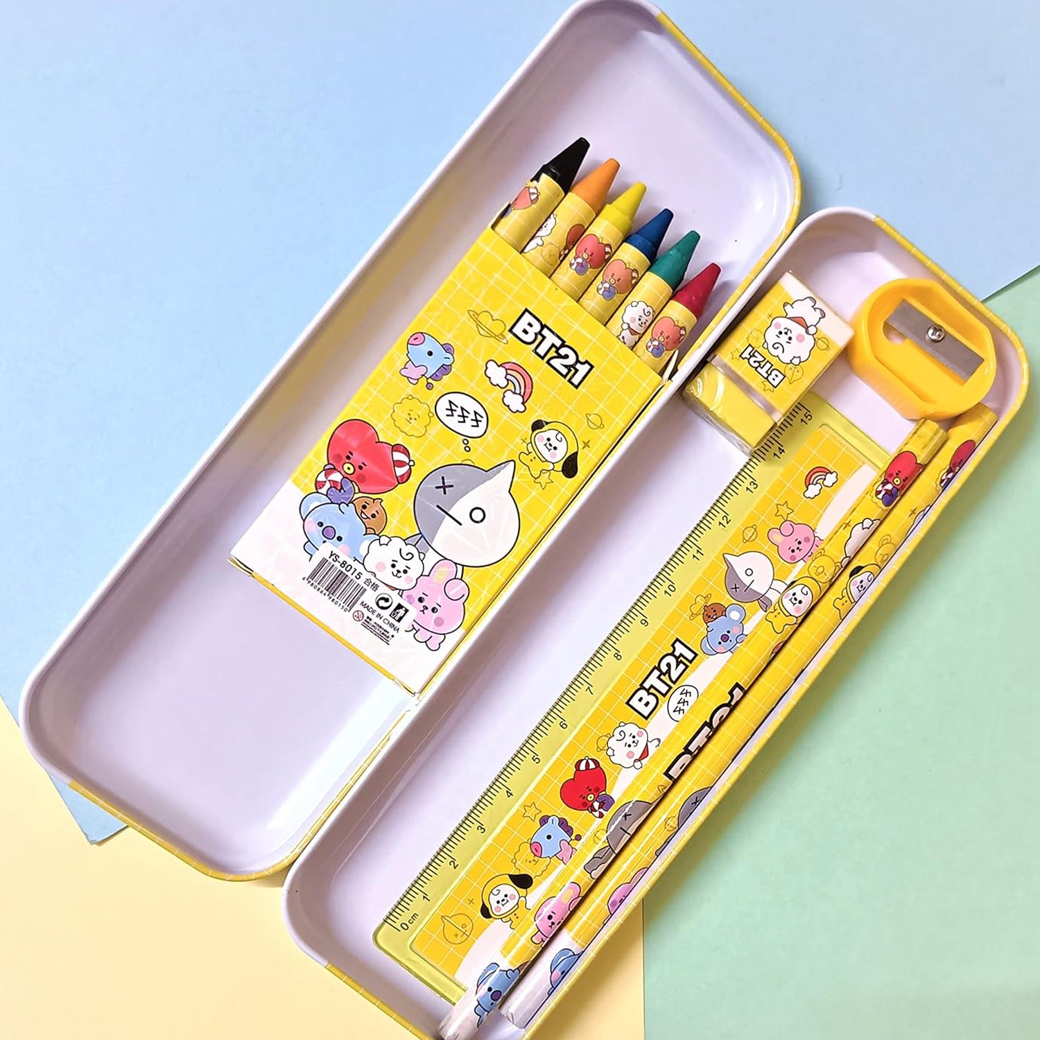 Wukusy 3294 kids stationery kit with metal pencil box, sharpener, eraser, and school supplies in a 12-piece set for boys and girls.