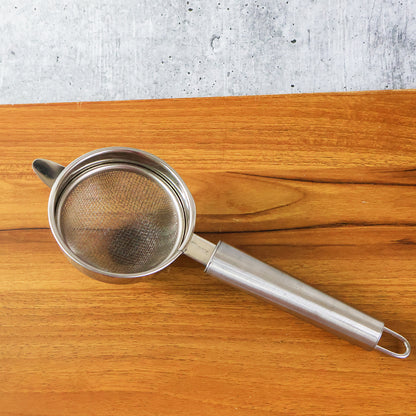 Wukusy Supermom Medium Euro Mesh Strainer for kitchen, showing fine mesh and sturdy handle for rinsing and straining food.
