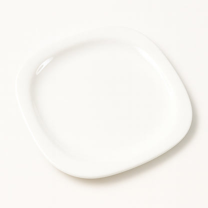 Wukusy premium square dinner plate, 32 cm, made of durable ceramic, displayed on a kitchen countertop.