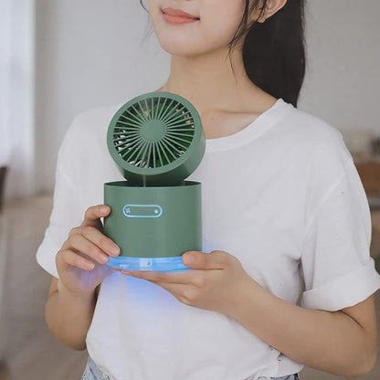 Wukusy 7615 mini desktop cooling fan with rotating spray, small water tank, compact design, ideal for home cooling.