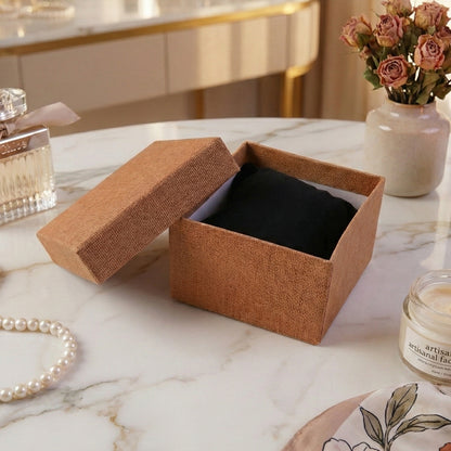 Wukusy multi-purpose storage gift box, 9x6 cm, made of sturdy material with a decorative design for gift or organization use.