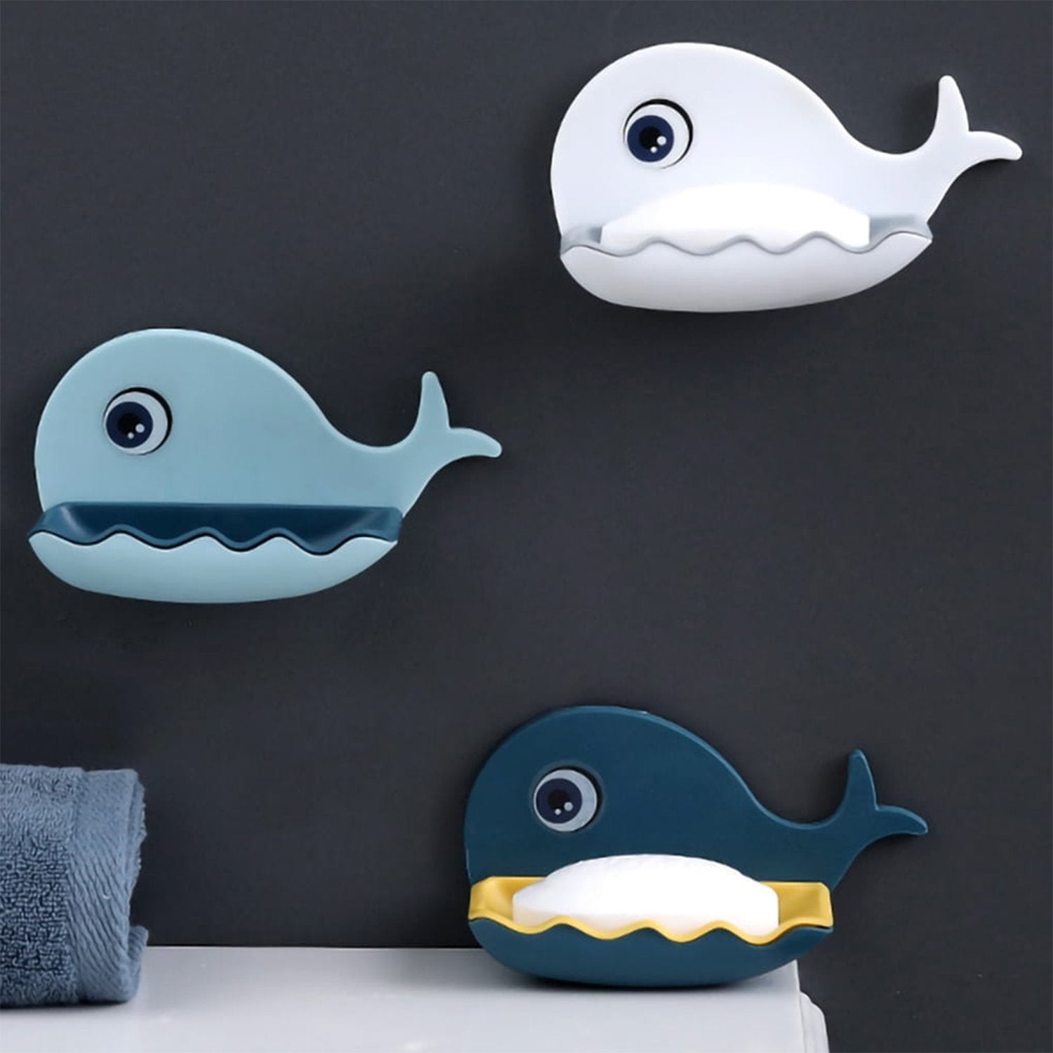 Pair of Wukusy fish-shaped waterproof wall-mounted soap dishes, adhesive bar soap holders for bathroom organization.