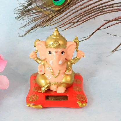 Decorative medium Lord Ganesh idol statue with solar-powered base, perfect for home decor, by Wukusy.