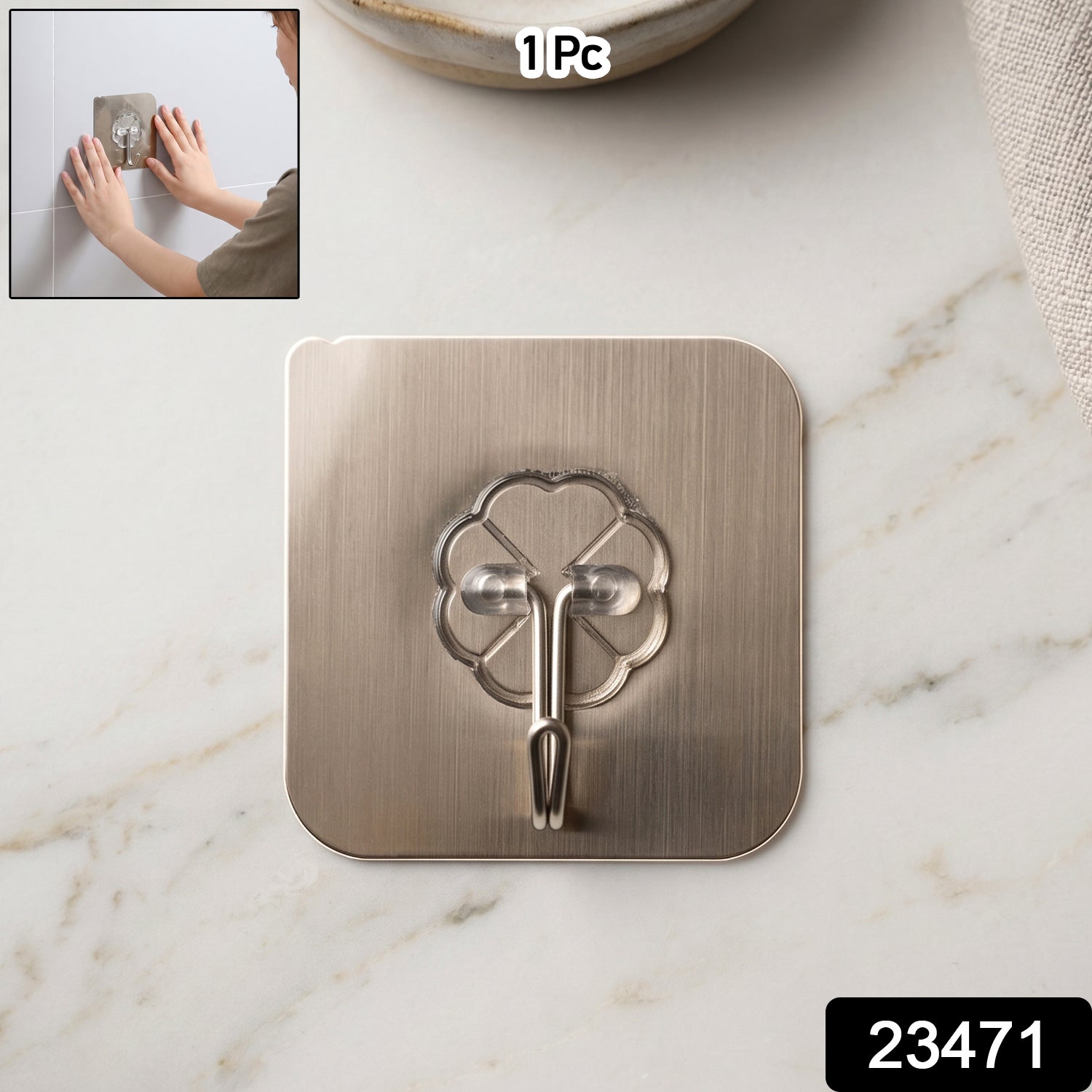 Wukusy self-adhesive plastic wall hook attached to bathroom wall for hanging towels or accessories.