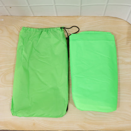 Wukusy inflatable air lounger sofa for outdoor relaxing and travel, shown deflated and ready for outdoor use.