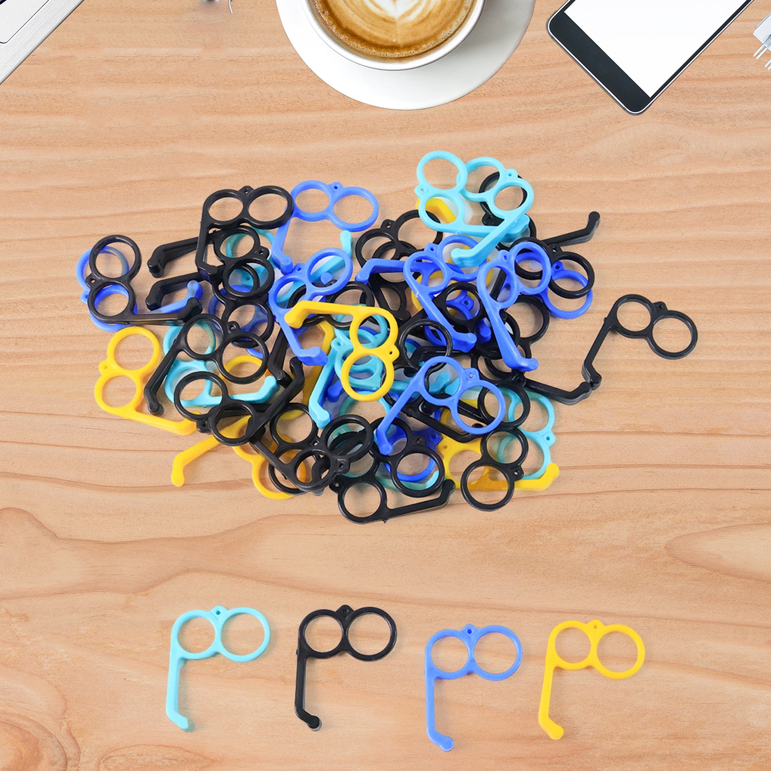 Set of 50 colorful plastic hand mobile stands for office use, designed by Wukusy, with each stand holding smartphones securely.