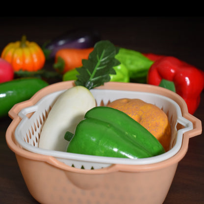 Wukusy 2-in-1 basket strainer used for rinsing fruits, vegetables, and other items with a mesh design in the image.