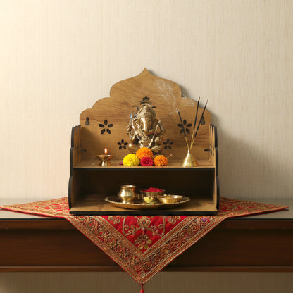 Wooden temple style home mandir stand for pooja by Wukusy, featuring intricate carvings and a sturdy design for prayer rituals.