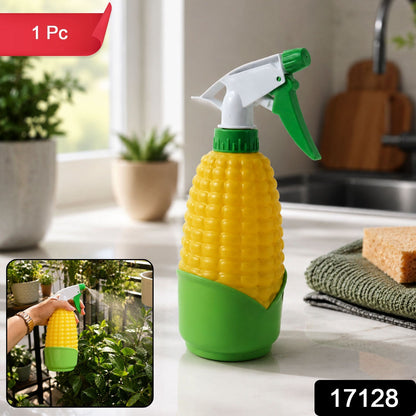 Wukusy corn-shaped trigger spray bottle for watering plants and cleaning, with a green plastic body and spray nozzle.