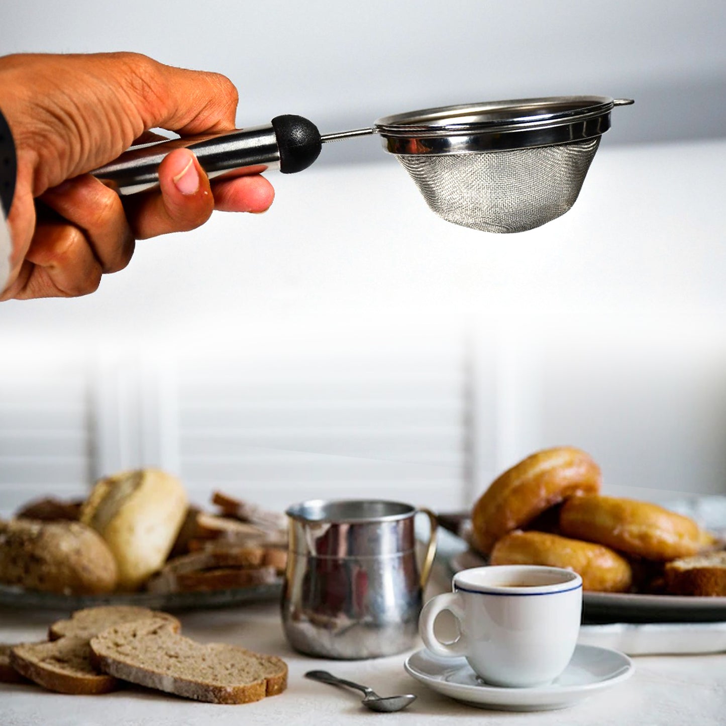 Wukusy stainless steel soup and tea strainer kitchen tool with fine mesh for easy filtering and straining liquids.