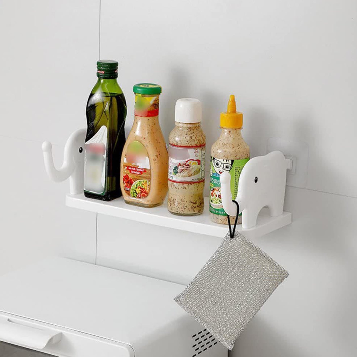 Cute elephant-shaped wall-mounted storage shelf by Wukusy, ideal for kitchen, bathroom, or bedroom organization.