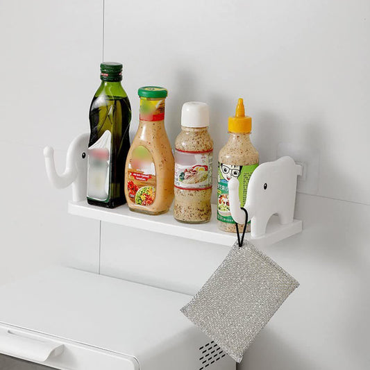 Cute elephant-shaped wall-mounted storage shelf by Wukusy, ideal for kitchen, bathroom, or bedroom organization.