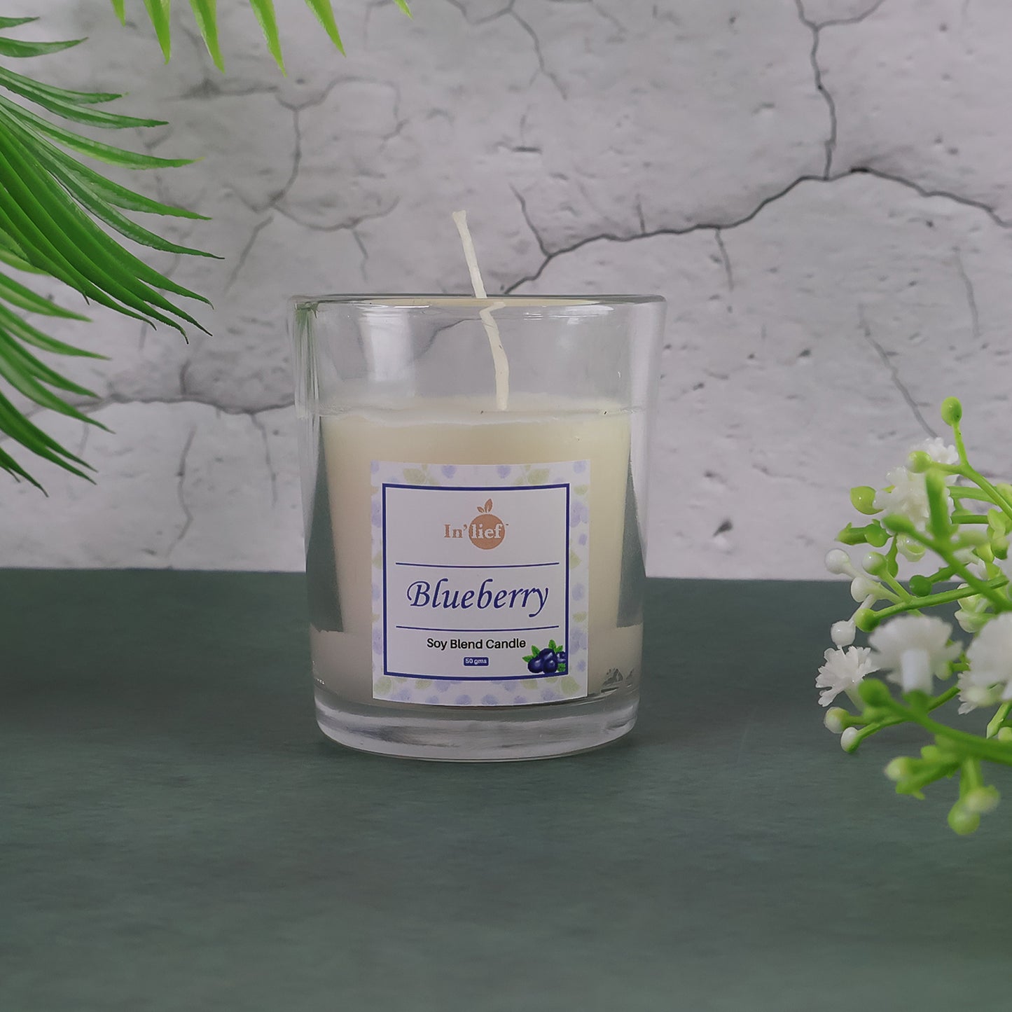 Blueberry soy-blend votive candle in glass holder by Wukusy, 50g, ideal for home decor and cozy ambiance.