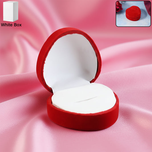 Heart-shaped velvet jewelry ring box by Wukusy, pink plush interior with a ring holder, ideal for jewelry storage or gifting.