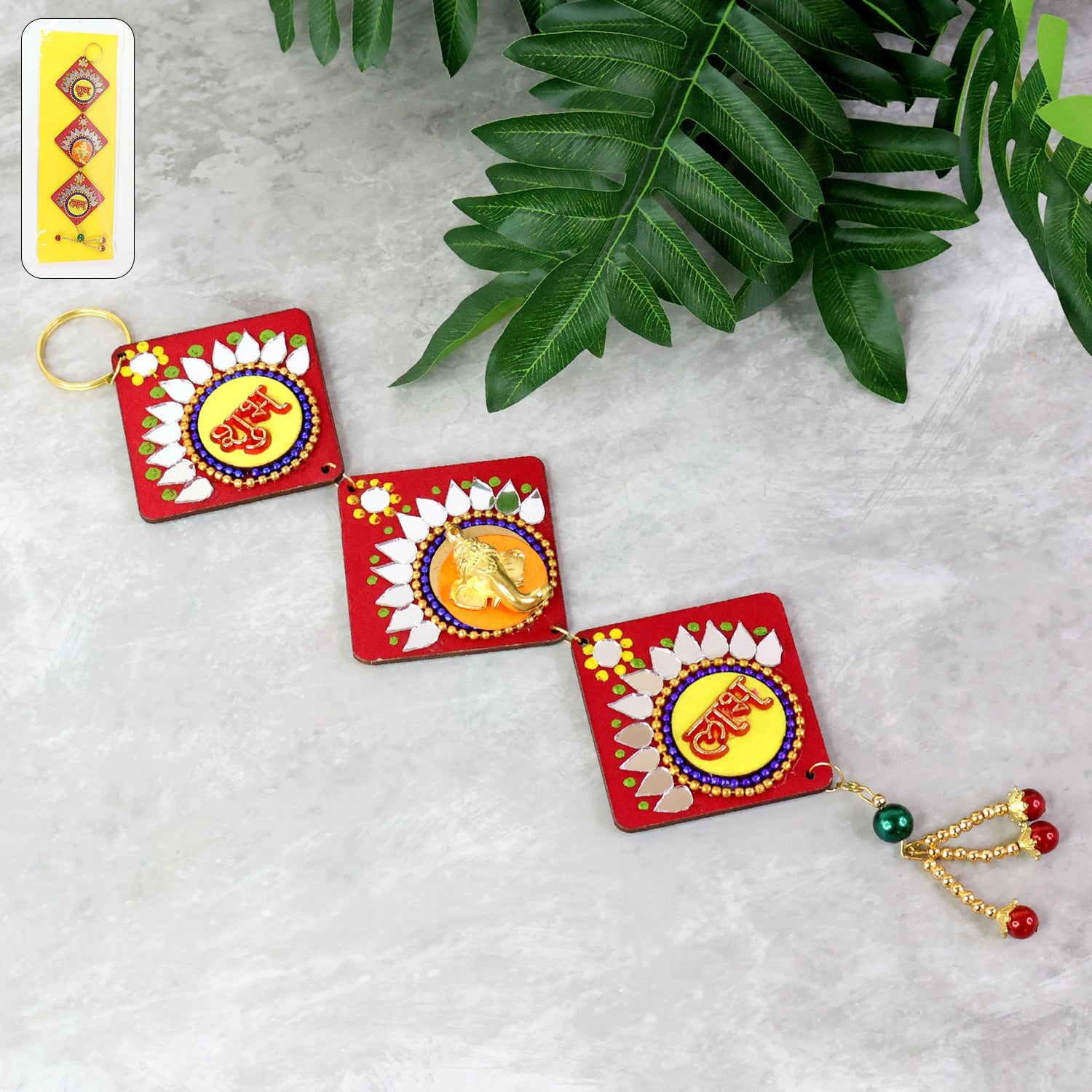 Traditional Labh Shubh decorative wall hanging from Wukusy, featuring intricate design for home decor.