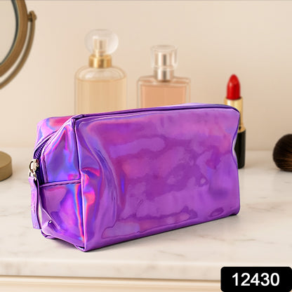 Holographic shiny waterproof travel cosmetic pouch by Wukusy with zipper closure, ideal for organizing cosmetics and toiletries.