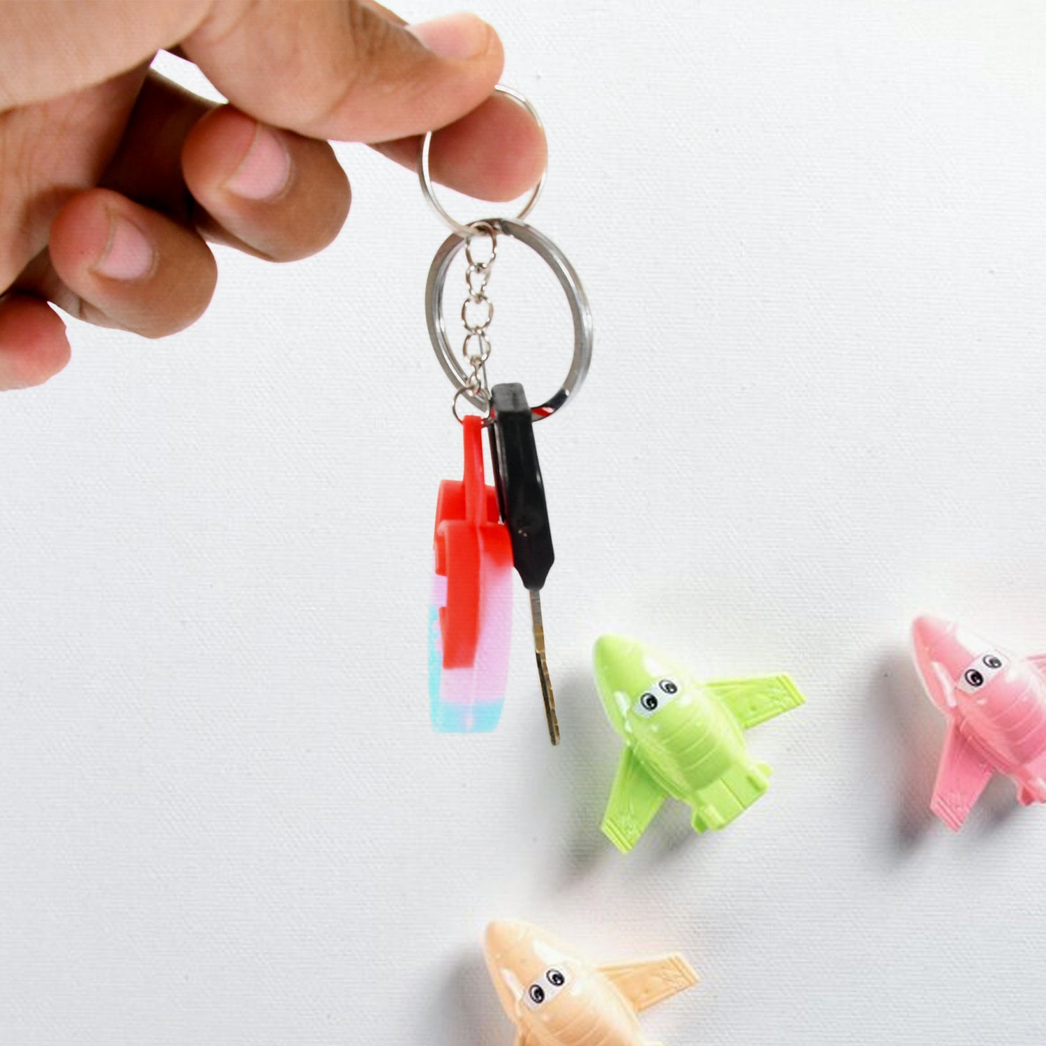 Wukusy Compact Silicone Pop It keychain toy with colorful bubbles, portable stress relief fidget toy for kids' birthday gifts