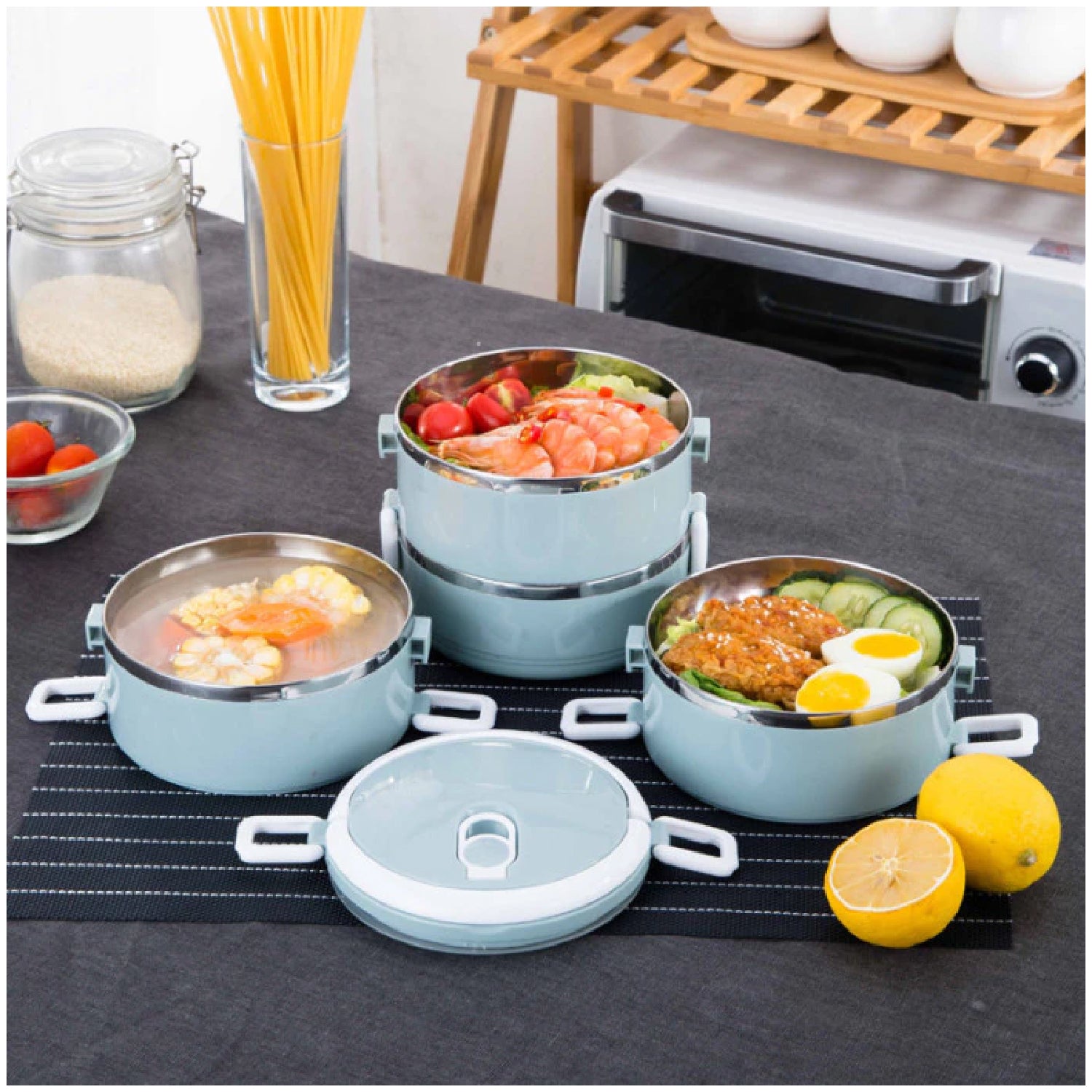 Wukusy 2871 multi-layer stainless steel hot lunch box with four compartments for home and kitchen use, food storage, and transport.