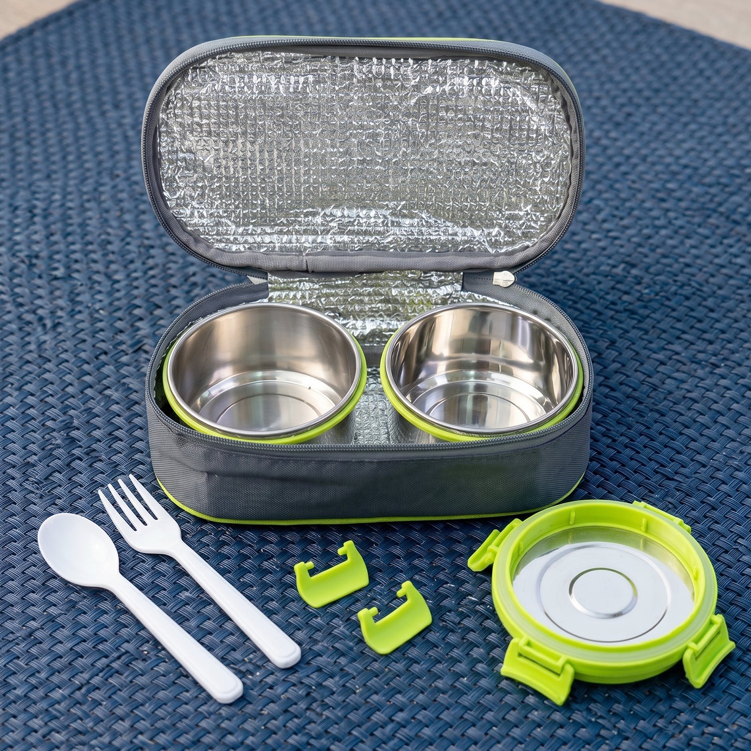 Wukusy Ganesh Sigma Twin 300 stainless steel lunch box set with two compartments and secure lids, ideal for meal storage.
