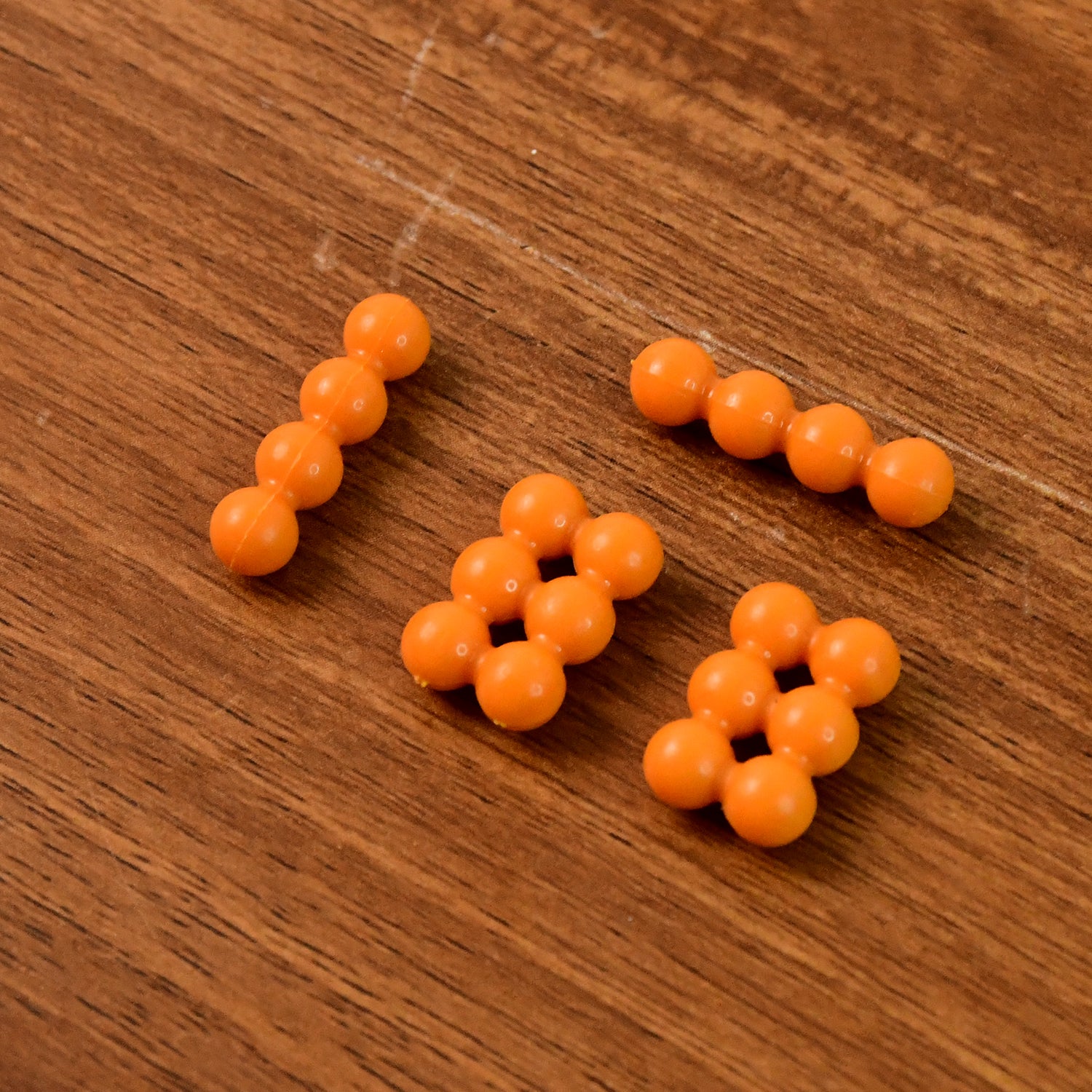 Wukusy 3D Ball Pyramid Toy, brain teaser puzzle with colorful spheres and geometric design for building and stacking fun.